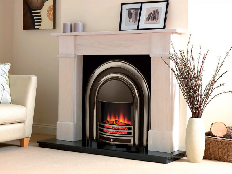 Portuguese limestone fireplace with an electric highlighted cast iron and black granite hearth.